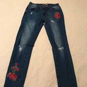 Skinny jeans with floral detail size 5